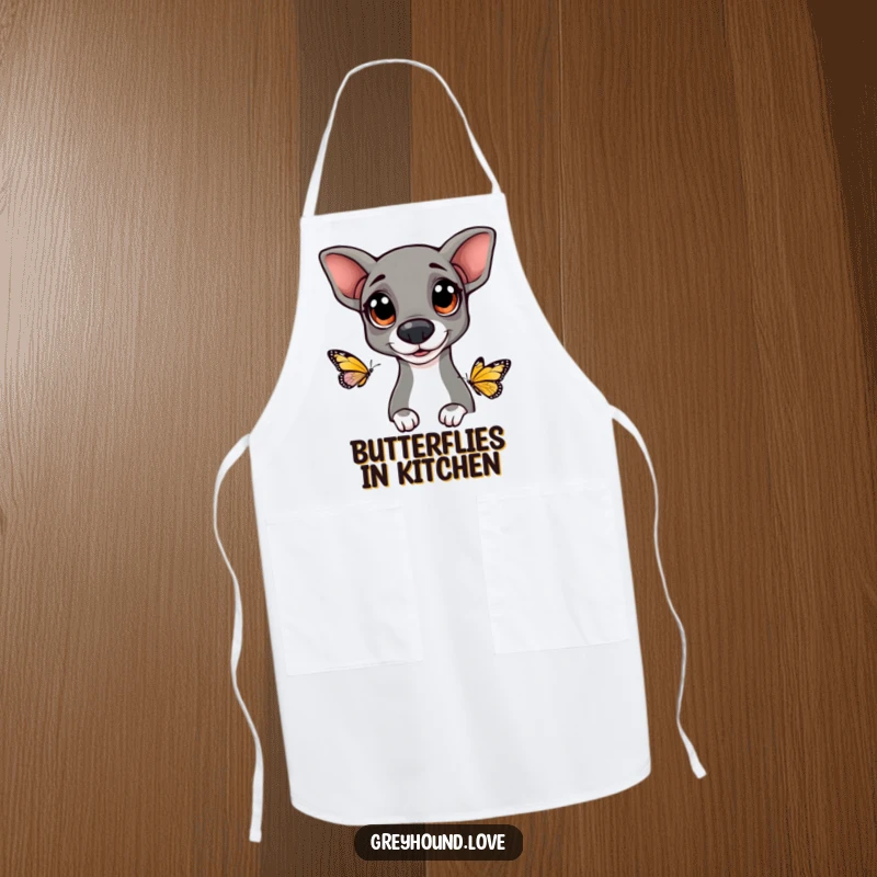 Funny Greyhound apron illustrating a dog with big, happy eyes curiously looking at a butterfly, perfect for kitchen fun.