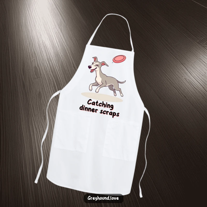 Funny APRON: A greyhound winks playfully while catching a frisbee mid-air, adding humor and protection to your cooking.