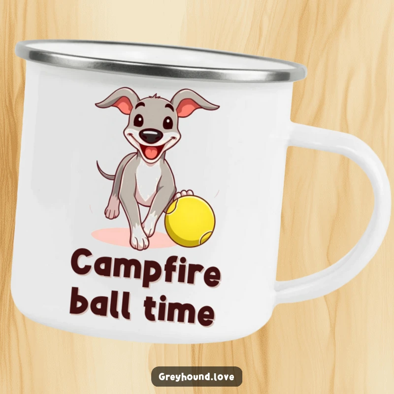 Funny greyhound camping mug with a comical grin, chasing a tennis ball, perfect for enjoying drinks outdoors with cheer.
