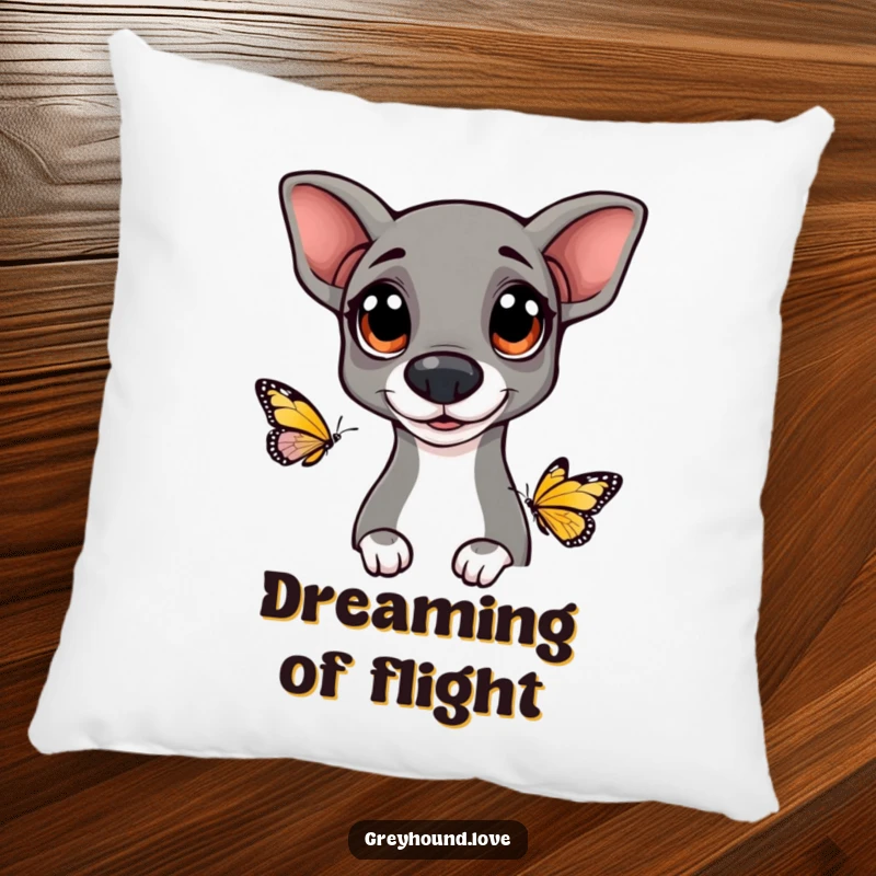 Funny Greyhound pillow featuring a dog with large, happy eyes curiously watching a butterfly, offering comfort and gentle humor.