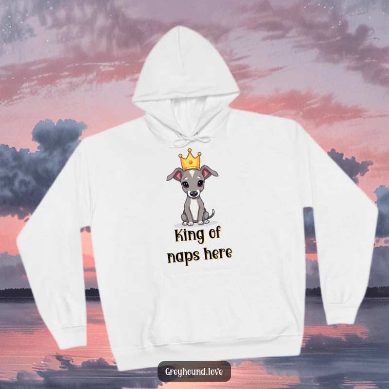 Funny hoodie depicting a greyhound elegantly balancing a tiny crown, radiating majestic and humorous vibes.
