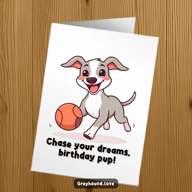 Funny Free Printable Birthday Card: happy greyhound with huge grin joyfully chases a bouncing ball, radiating pure fun.