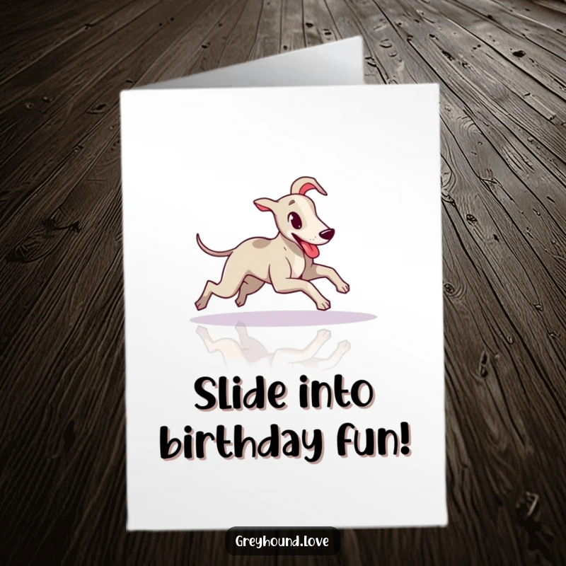 Funny Free Printable Birthday Card: Slender greyhound doing a playful slide across a shiny floor, tongue lolling out with glee.