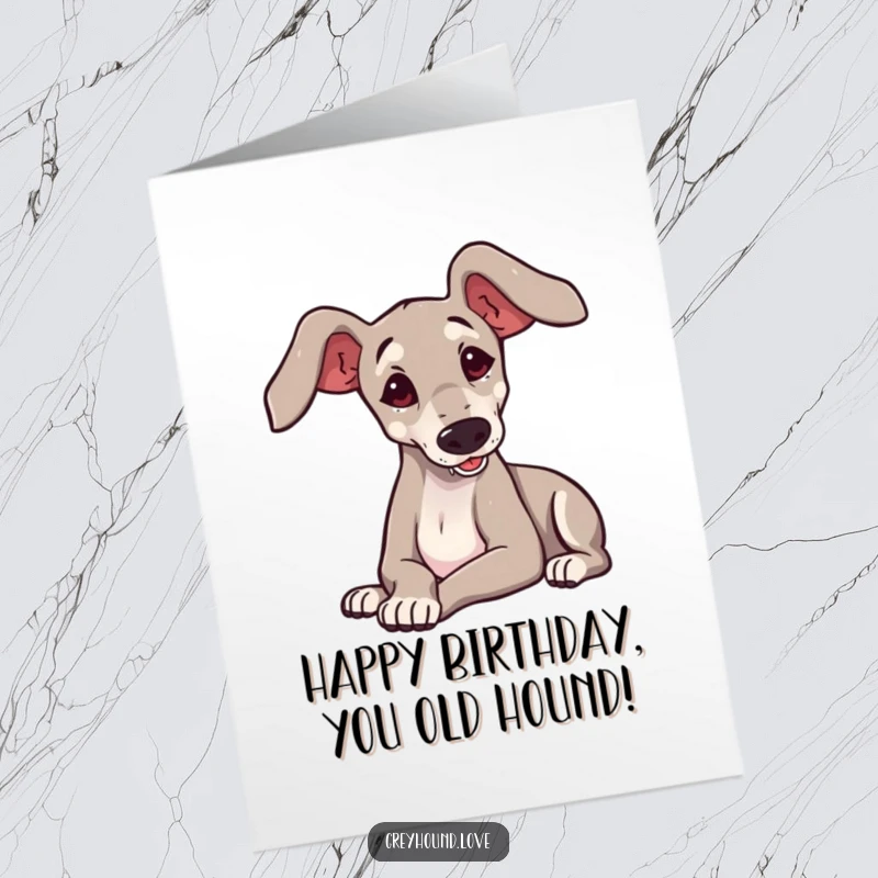 Funny Free Printable Birthday Card featuring a cute greyhound with big ears playfully flopping onto its side in a silly pose.