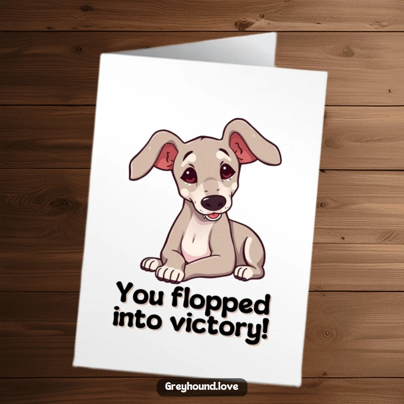 Funny Free Printable Congratulations Card showing a cute greyhound with large ears hilariously flopping onto its side in a celebratory manner.