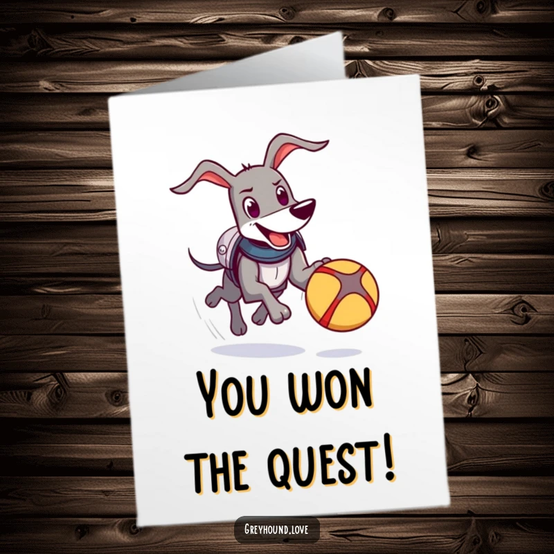 Funny Free Printable Congratulations Card: A happy greyhound dons comical armor while enthusiastically chasing a bouncing ball.