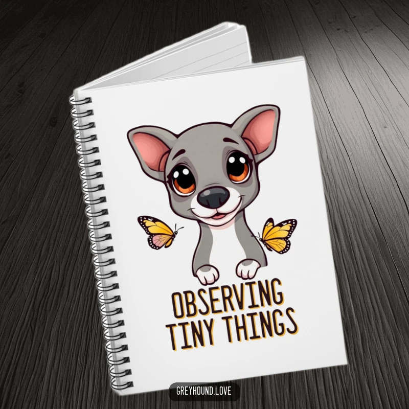 Funny Greyhound notebook featuring a dog with big, happy eyes curiously observing a butterfly, perfect for notes and inspiration.