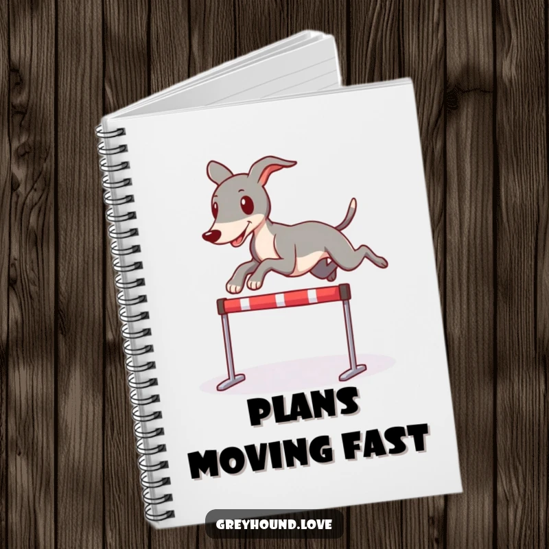 Funny notebook with a greyhound character playfully leaping over a miniature hurdle, ideal for jotting down fast ideas.