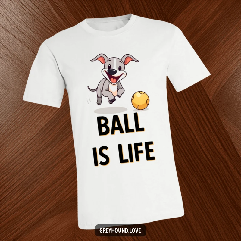 Funny greyhound t-shirt, a smiling dog enthusiastically chasing a bouncing ball, full of energy.