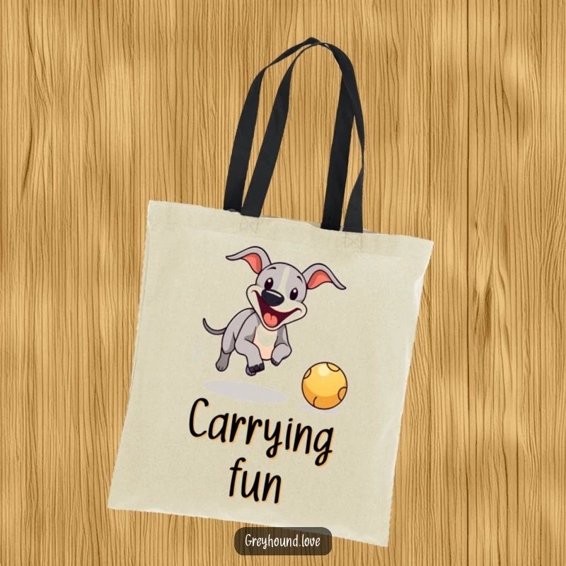 Funny greyhound ball chase tote bag, showcasing a joyful dog with a big smile pursuing a bouncing ball.