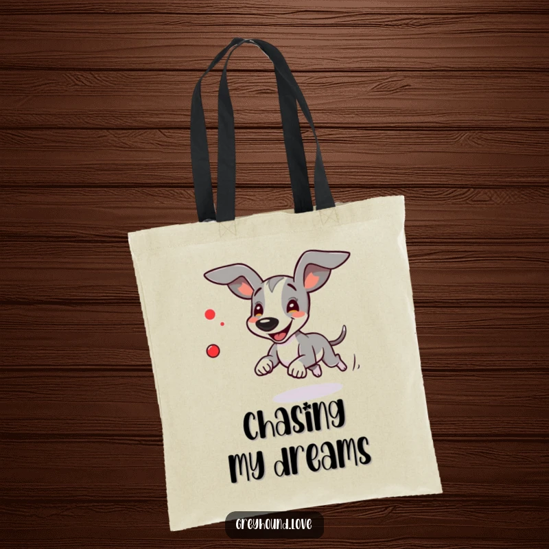 Funny Greyhound Tote Bag: A greyhound excitedly chasing a small red dot with ears flapping.