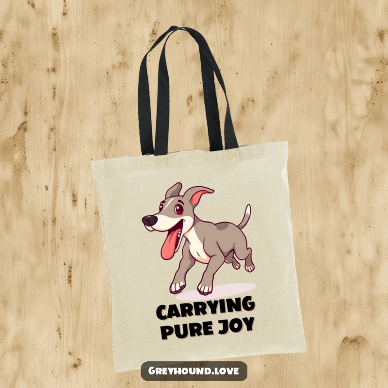 Funny tote bag with a happy greyhound lunging forward with its tongue out, perfect for carrying daily essentials with a smile.