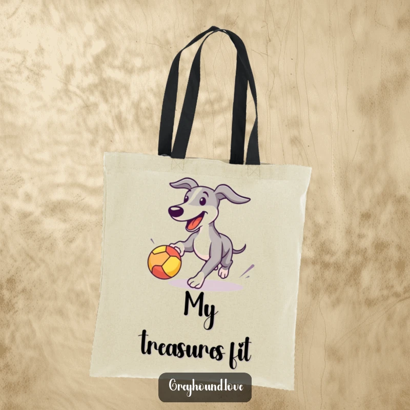 Funny Greyhound tote bag illustrating a happy dog playfully chasing a bouncing ball, combining style and humor.