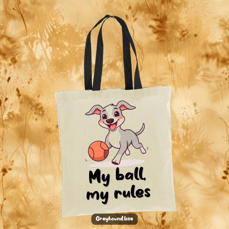 Funny Greyhound Tote Bag with a big-smiling dog excitedly chasing a bouncing ball, ideal for carrying essentials with humor.